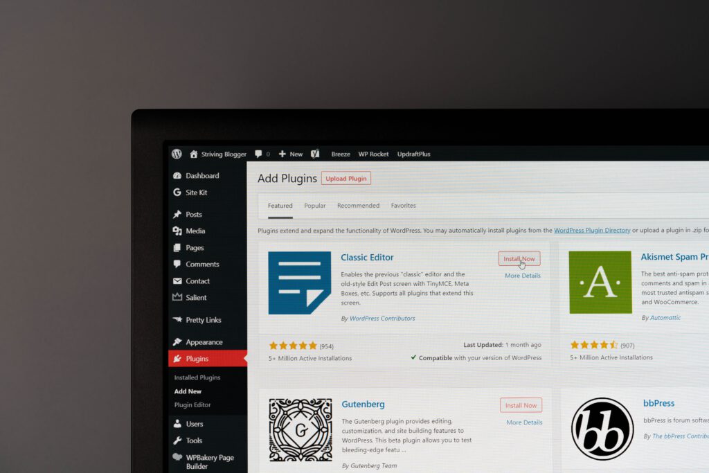 laptop with WordPress interface on screen